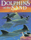 Dolphins on the sand /