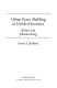 Urban peace-building in divided societies : Belfast and Johannesburg /