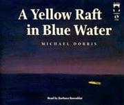 A yellow raft in blue water /