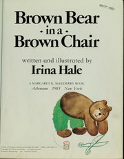 Brown bear in a brown chair /