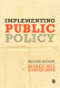 Implementing public policy : an introduction to the study of operational governance /