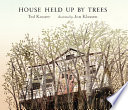 House held up by trees /