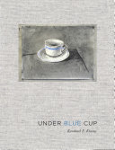 Under blue cup /