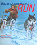 Sled dogs run /
