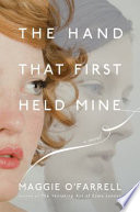 The hand that first held mine /