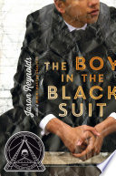 The boy in the black suit /