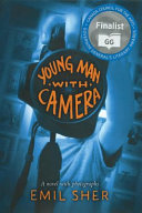 Young man with camera /