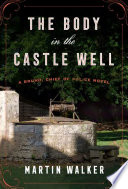 The body in the castle well : a Bruno, chief of police novel /